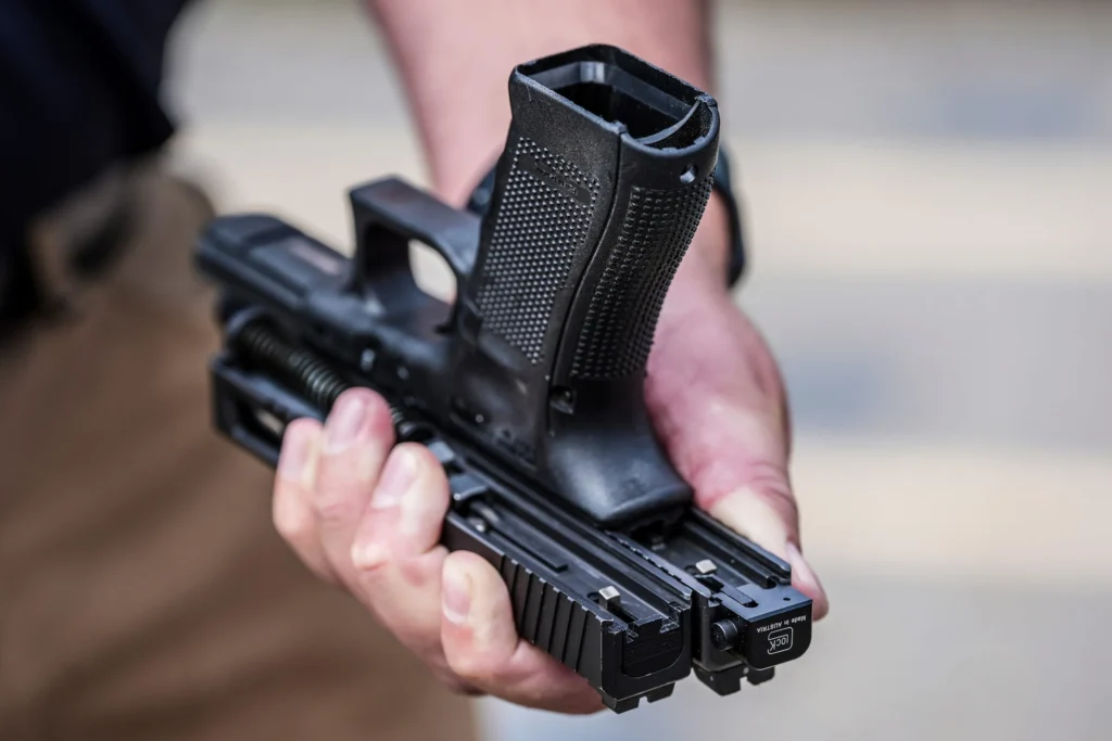 holding a glockslide.webp